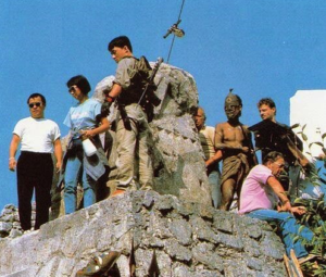 On the set of Jackie Chan's <em>Armour of God</em>, which Eric co-produced.