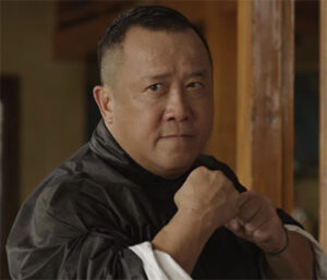 Eric Tsang in Ip Man: The Final Fight.