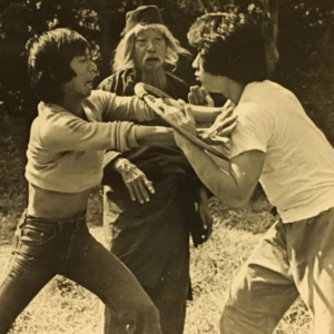 Yuen Woo Ping directing his father, Yuen Siu-Tien and Jackie Chan in Snake in the Eagle's Shadow. 